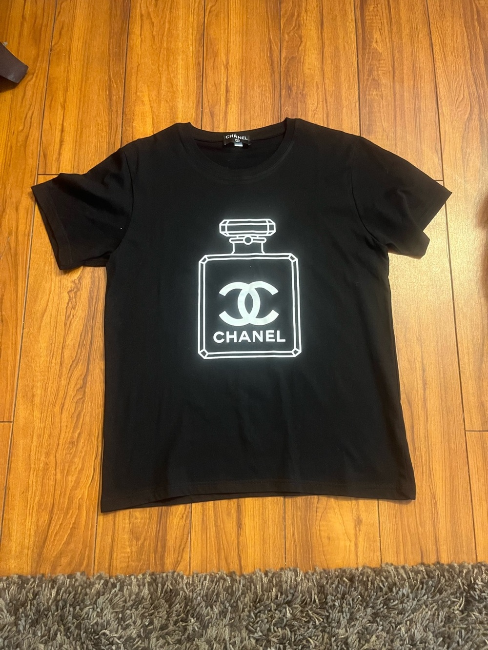CHANEL style Black T-Shirt with White Perfume Bottle Graphic